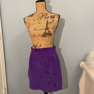 Purple Suede Mini Skirt size 7/8 runs small. Good condition. Ready for fun.